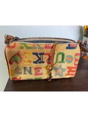Dooney & Bourke Small Purse Clutch with Wrist Strap Logo Hang Tag (see below)